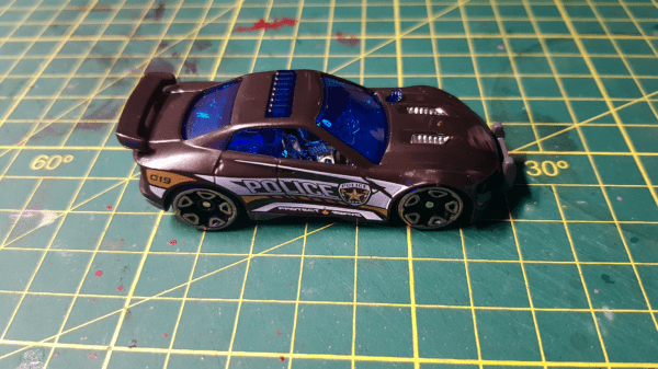 a closeup photo of a Metal Machines brand scale model car, for conversion for the game Gaslands